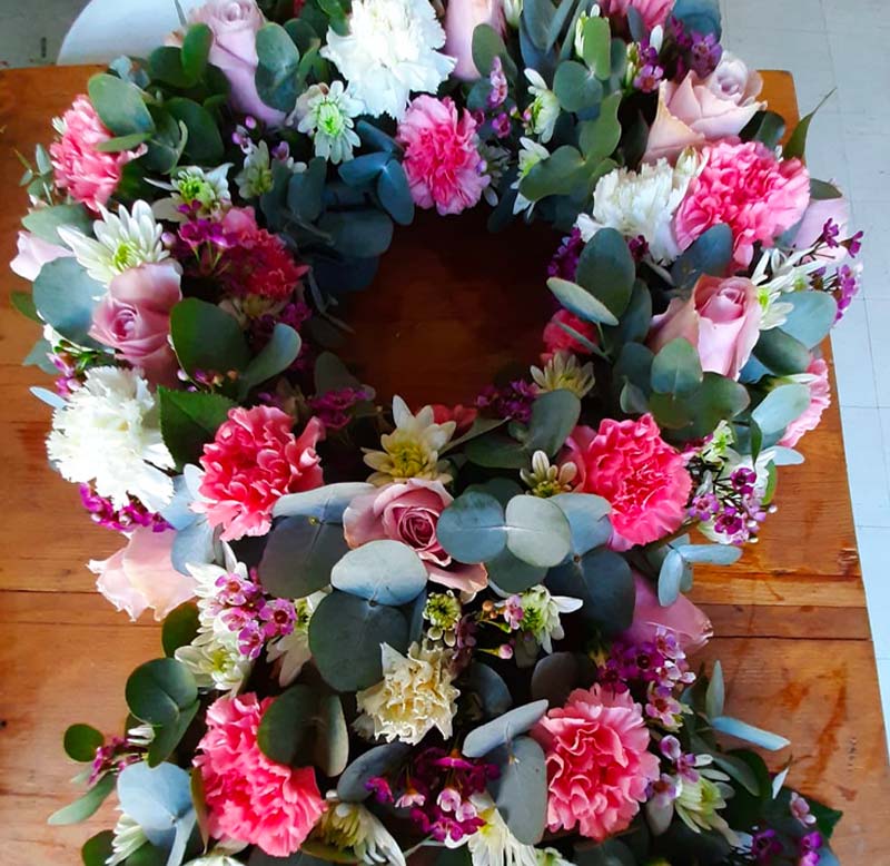 4 F, delux heart shaped sympathy wreath by Logan Floral Designs and Gifts